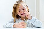 Beautiful Child Having Breakfast At Home Stock Photo
